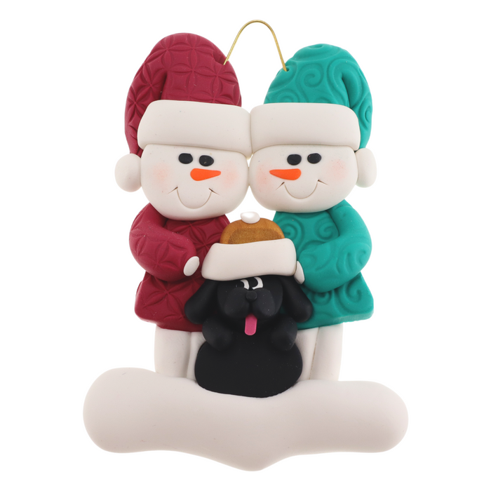 Ornament of snowman couple in red and green shirts and hats with black dog in Christmas hat.