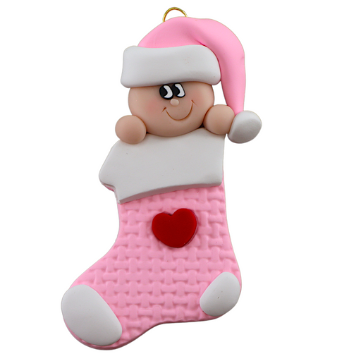 Ornament with infant head in a pink hat poking out of a pink stocking.