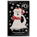 Ornament of white cat in red and white polka dot Christmas hat and scarf, on display backing card.