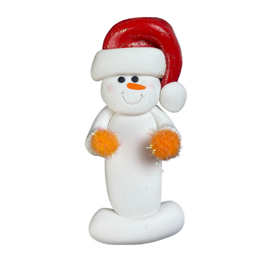 Ornament of white snowman in red hat holding orange cheerleader pom-poms.