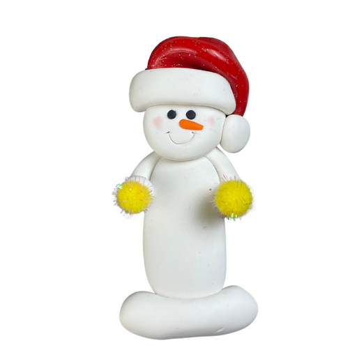 Ornament of white snowman in red hat holding yellow cheerleader pom-poms.