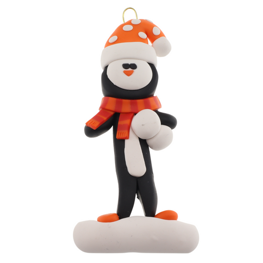 Penguin wearing orange hat and scarf ornament.