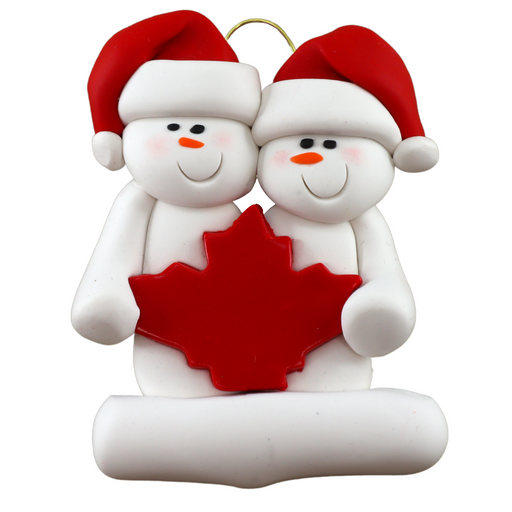 Family ornament with 2 white snowmen in red hats, gathered around a red maple leaf.