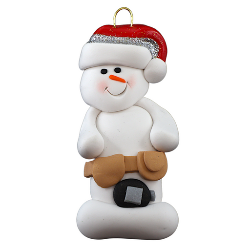 Ornament of white snowman in red hat wearing tool belt with tape measure.