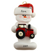 Ornament of white snowman in red hat holding a red tractor, personalized with name.