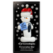 Ornament of white snowman in red hat holding a microphone and blue music book, on display backing card.