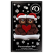 A couple’s ornament of two brown bears holding a red heart together, on display backing card.