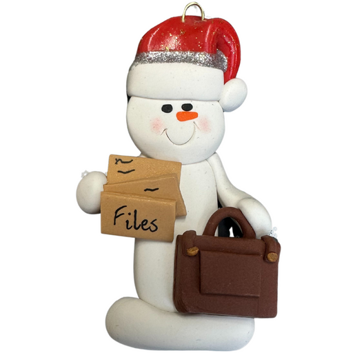 Ornament of white snowman in red hat holding briefcase and files.