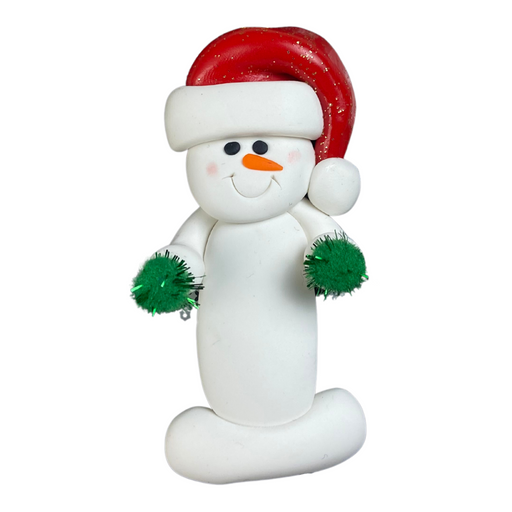 Ornament of white snowman in red hat holding green cheerleader pom-poms.