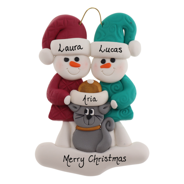 Ornament of snowman couple in red and green shirts and hats with grey cat in Christmas hat, personalized with names.