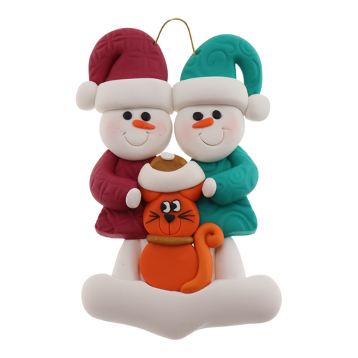 Ornament of snowman couple in red and green shirts and hats with a orange cat in Christmas hat.