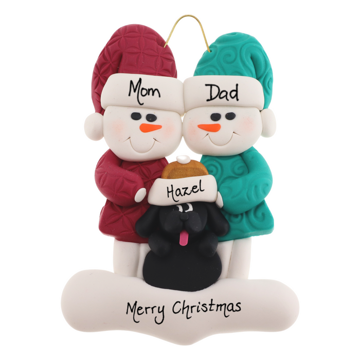 Ornament of snowman couple in red and green shirts and hats with black dog in Christmas hat, personalized with names.