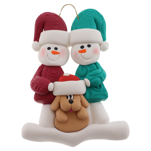 Ornament of snowman couple in red and green shirts and hats with tan dog in Christmas hat.