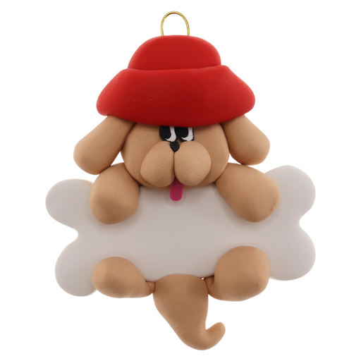 Ornament of tan dog in red hat hanging on a white bone.