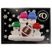 Family ornament with 4 white snowmen in bright hats with a football, on display backing card.