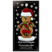 Tan bear in red festive hat holding two candy canes ornament, on display backing card.