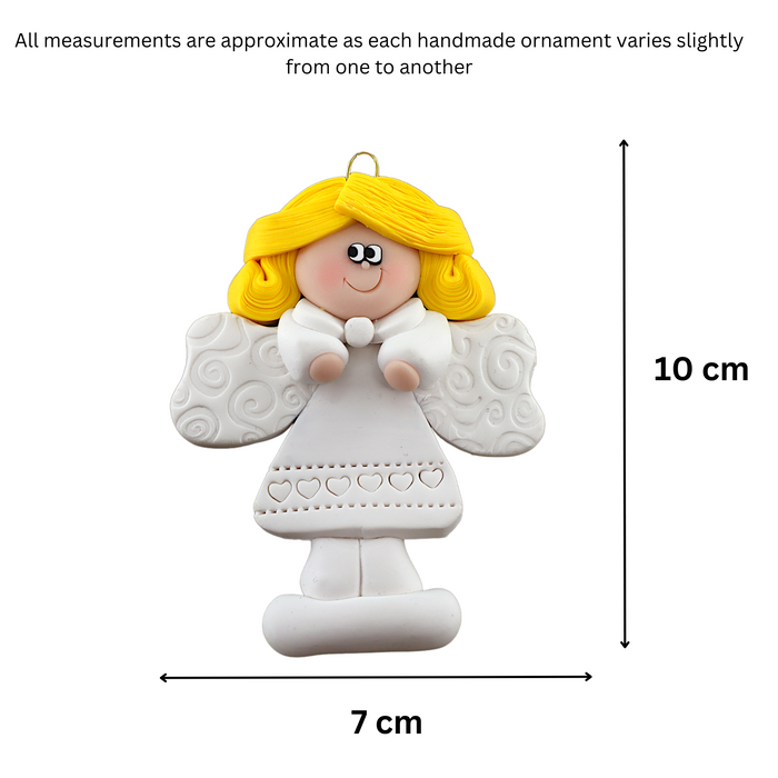 Angel wearing white with blonde hair ornament, graphed to show size (7x10cm).