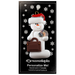 Ornament of white snowman in red hat holding a briefcase and paper bills, on display backing card.
