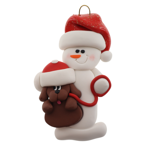 Ornament of white snowman in red hat holding a brown dog on a leash.