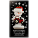 Ornament of white snowman in red hat holding a red tractor, on display backing card.