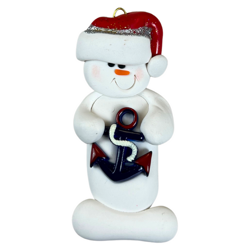 Ornament of white snowman in red hat holding a plastic anchor.