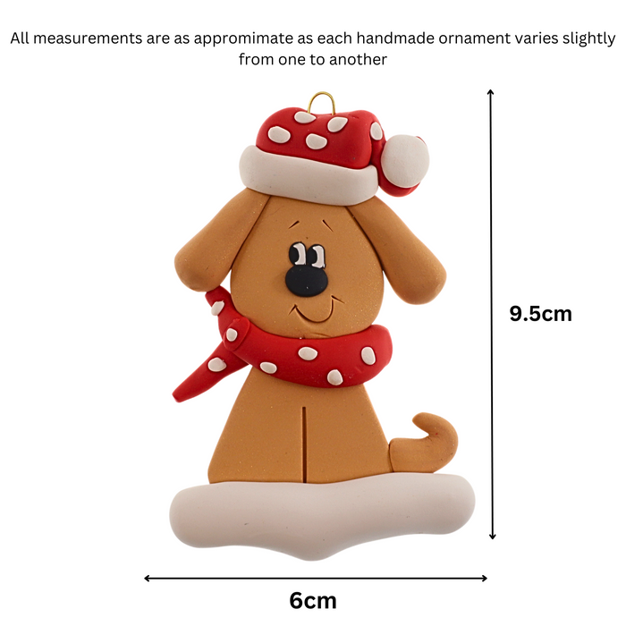 Ornament of tan dog in a red and white polka dot Christmas hat and scarf, graphed to show size (6x10.5cm).