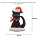 Ornament of black cat in red and white polka dot Christmas hat and scarf, graphed to show size (6.5x10.5cm).