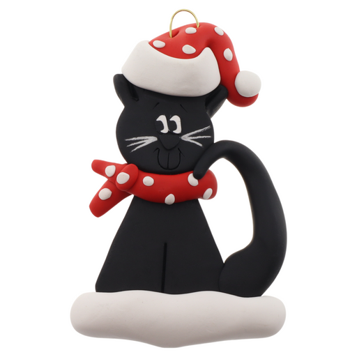 Ornament of black cat in red and white polka dot Christmas hat and scarf.