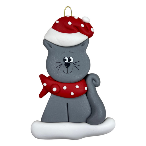 Ornament of grey cat in red and white polka dot Christmas hat and scarf.