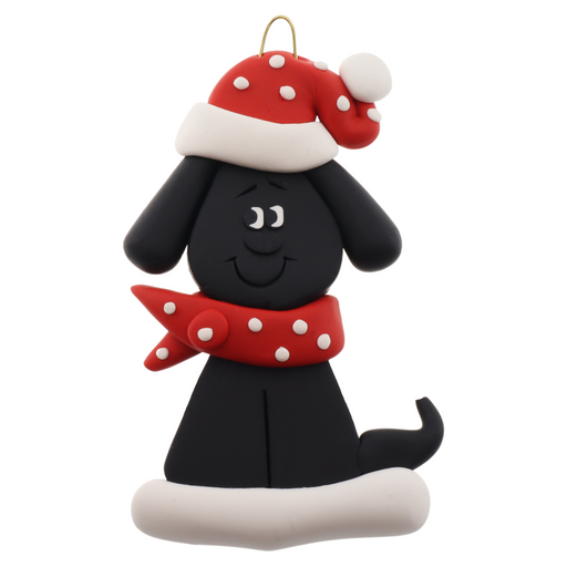 Ornament of black dog in a red and white polka dot Christmas hat and scarf.