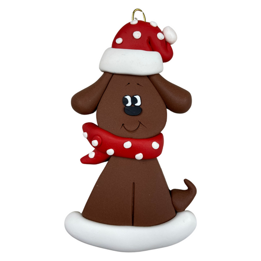 Ornament of brown dog in a red and white polka dot Christmas hat and scarf.