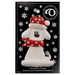Ornament of white dog in a red and white polka dot Christmas hat and scarf, on display backing card.
