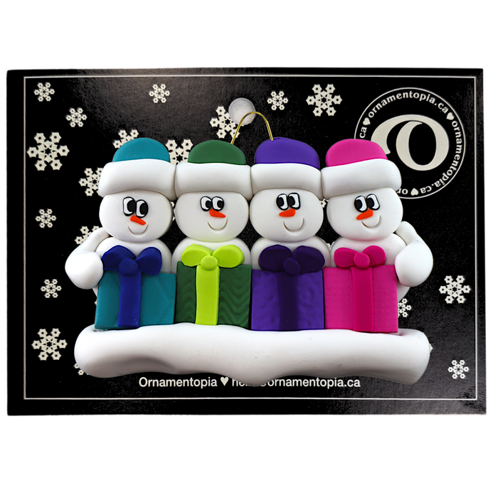 Family ornament with 4 white snowmen in colourful hats holding matching presents, on display backing card.