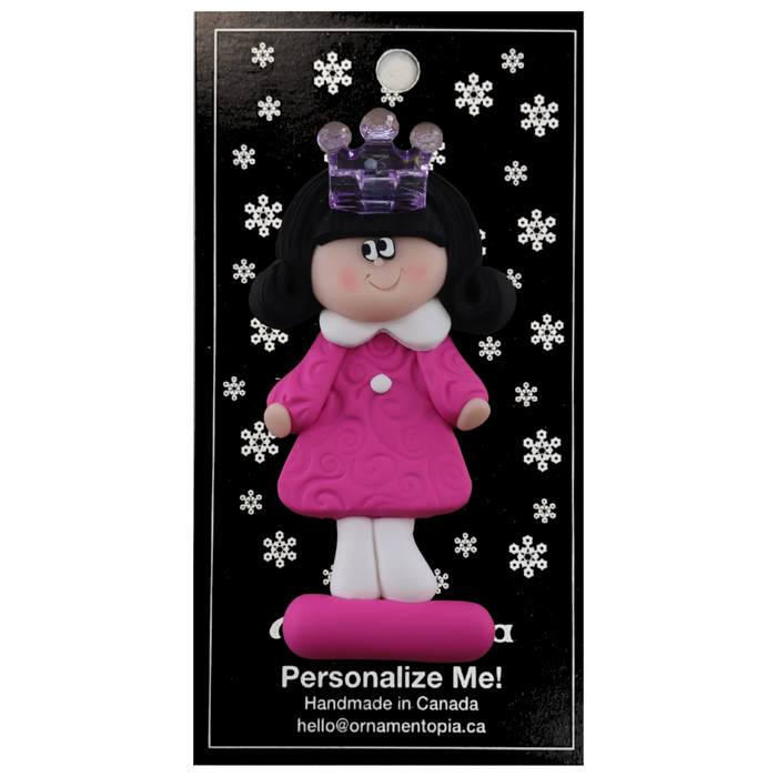 Pink princess with crown and black hair ornament, on display backing card.