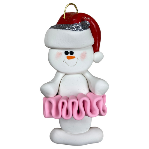 Ornament of white snowman in red hat wearing a pink tutu.