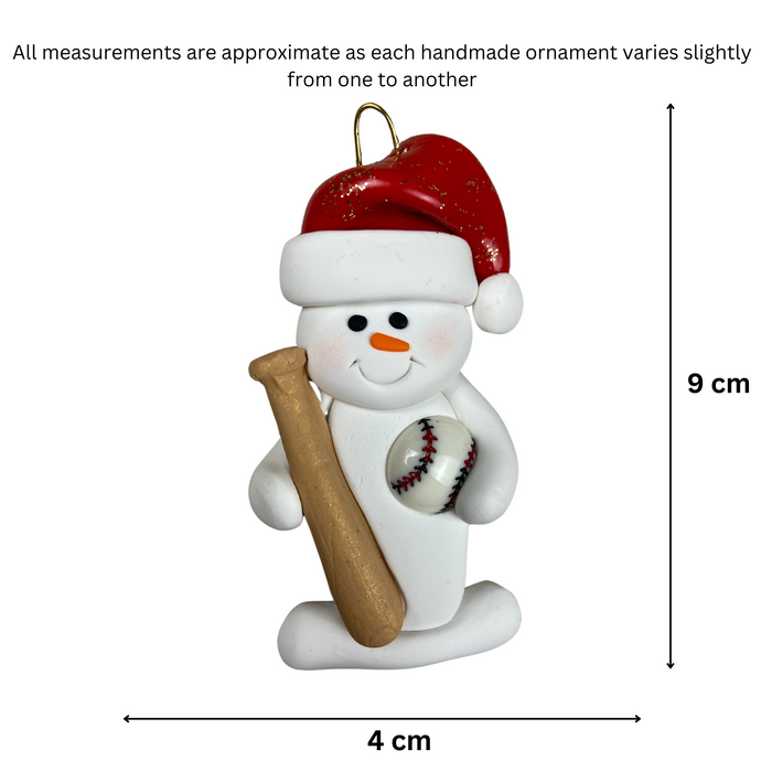 Ornament of white snowman in red hat holding a baseball bat and a baseball, graphed to show size (4x9cm).