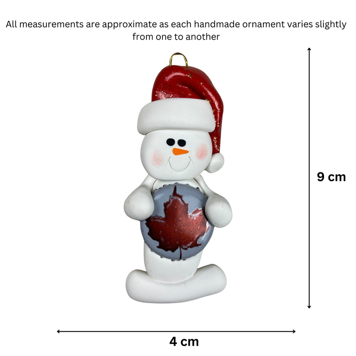 Ornament of white snowman in red hat holding a beer bottle cap, graphed to show size (4x9cm).