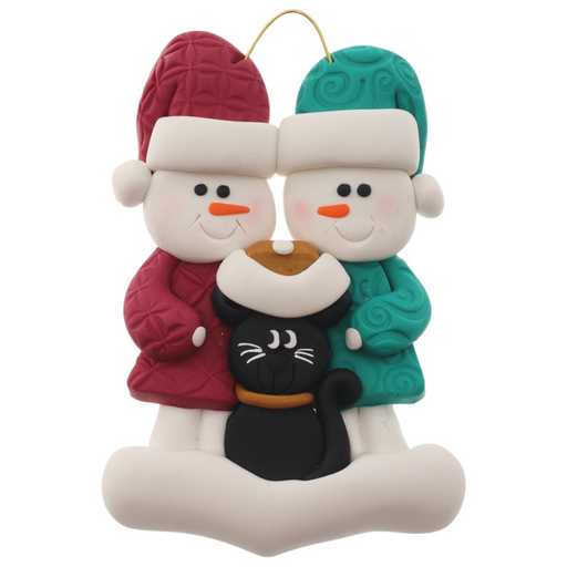 Ornament of snowman couple in red and green shirts and hats with a black cat in Christmas hat.