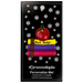 Stack of books and red apple teacher appreciation ornament, on display backing card.